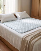 Traversa lavabile LEIDRY™ stesa su un letto matrimoniale